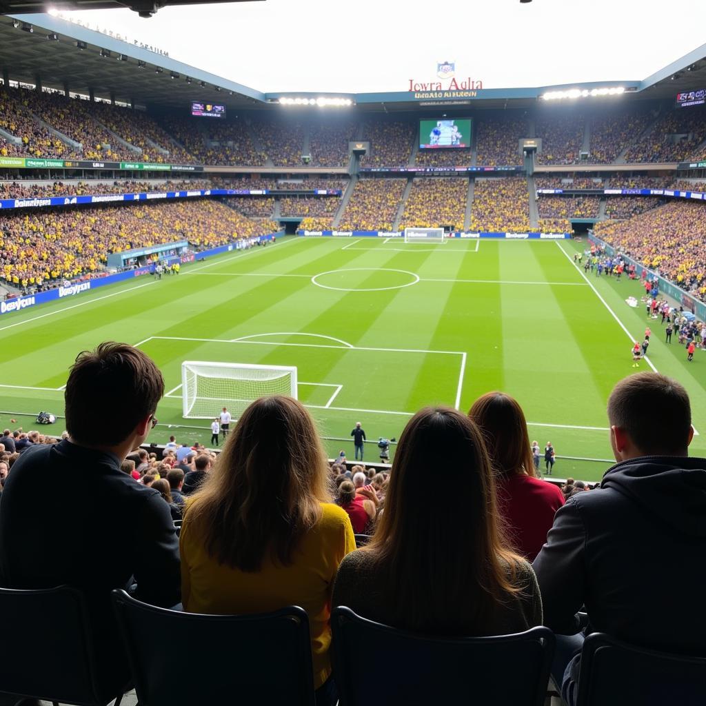 A group of friends enjoying the game in the visitors section 