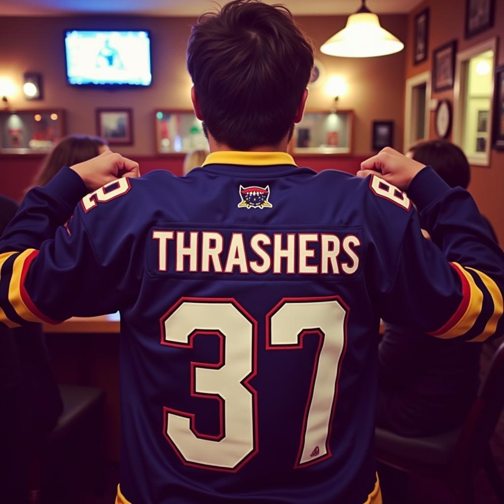 Fan Showing Off Their Thrashers Jersey