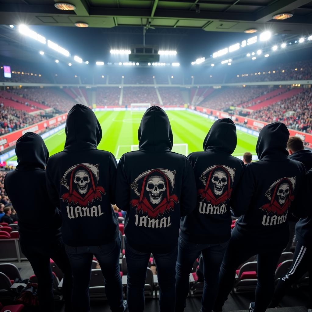 Fans Wearing Matching Grim Reaper Hoodies at a Soccer Match