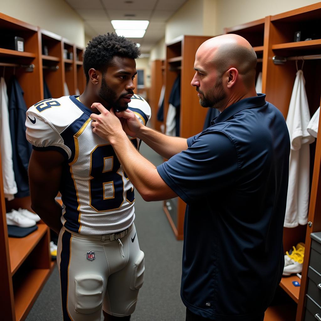 A football player getting fitted for shoulder pads