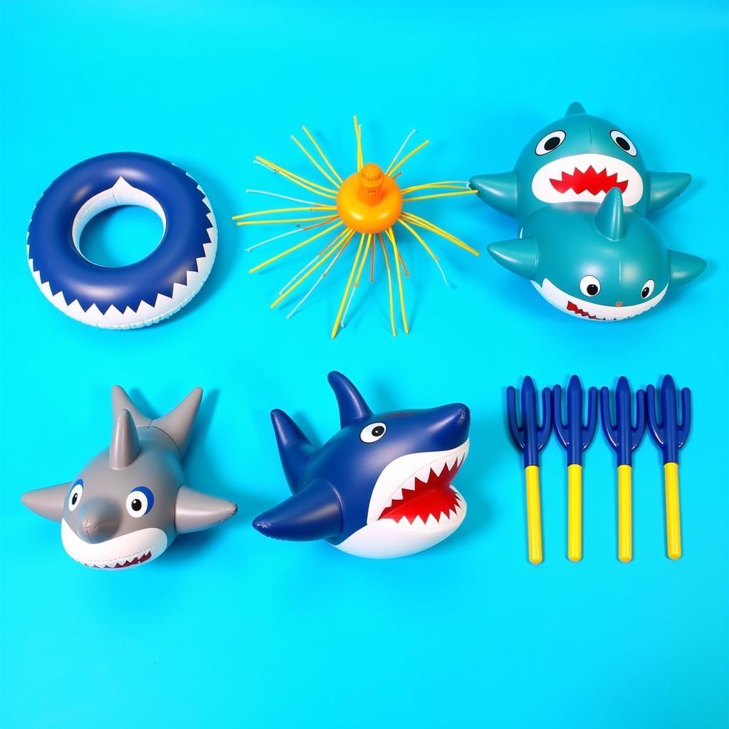 Assortment of inflatable shark pool toys