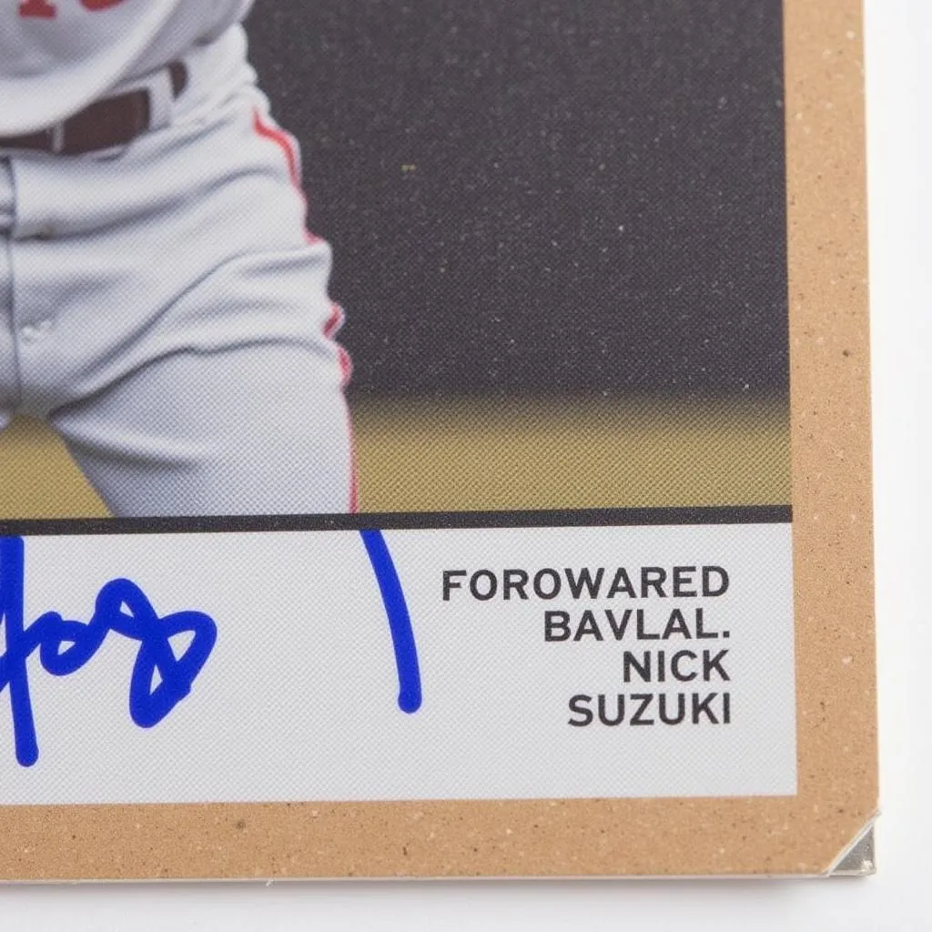 Close-up of a Nick Suzuki Rookie Card