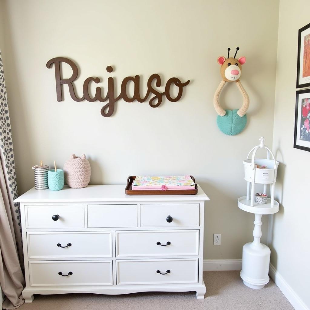 Nursery decor incorporating a custom name sign