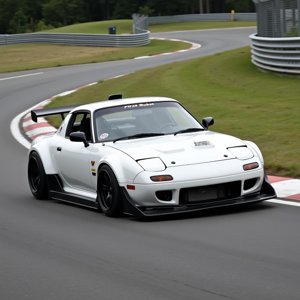 White Rocket Bunny RX7 on a racetrack