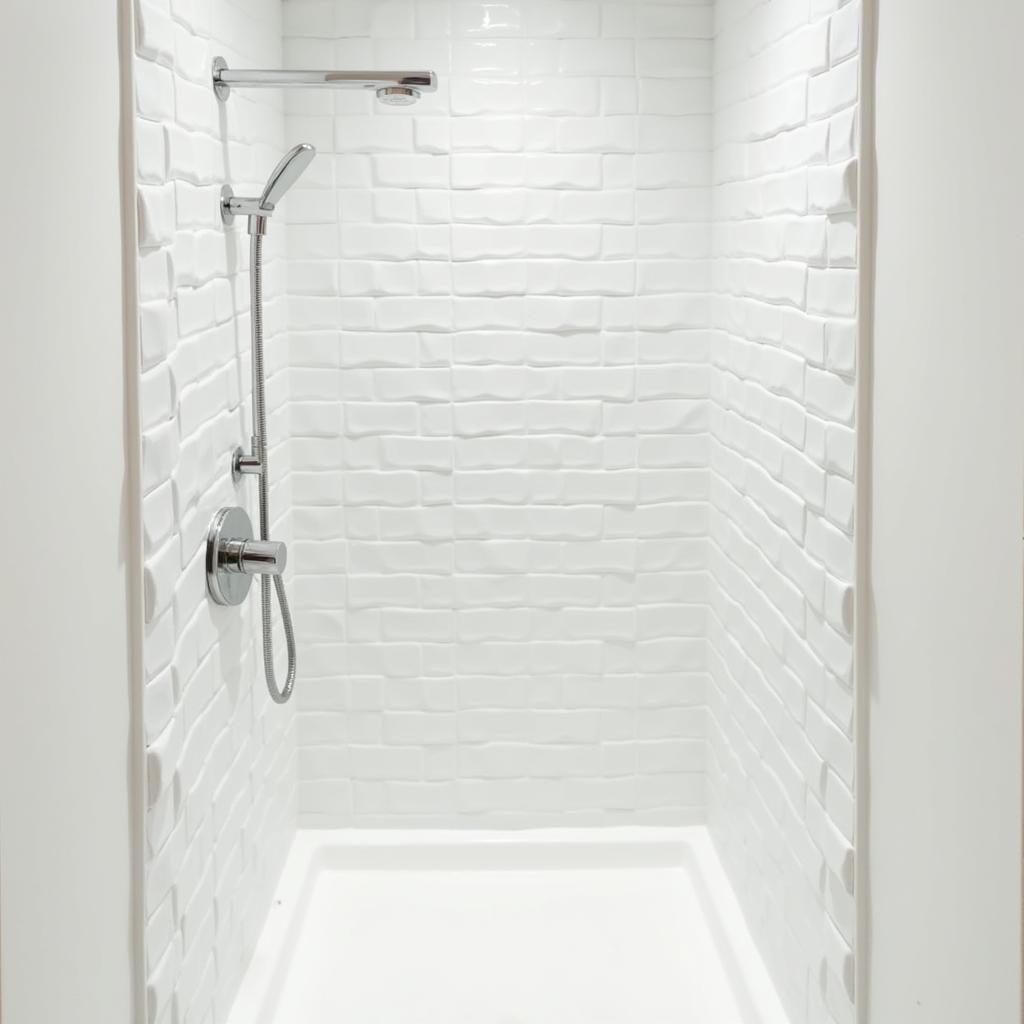 Modern bathroom featuring white rounded edge tiles