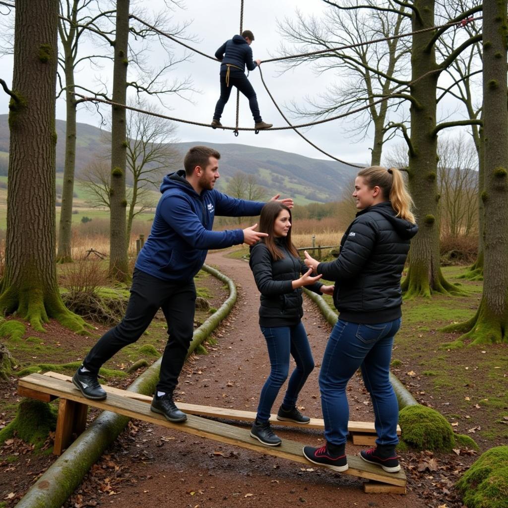 Team navigating a rope course during a team building activity in Northern Ireland