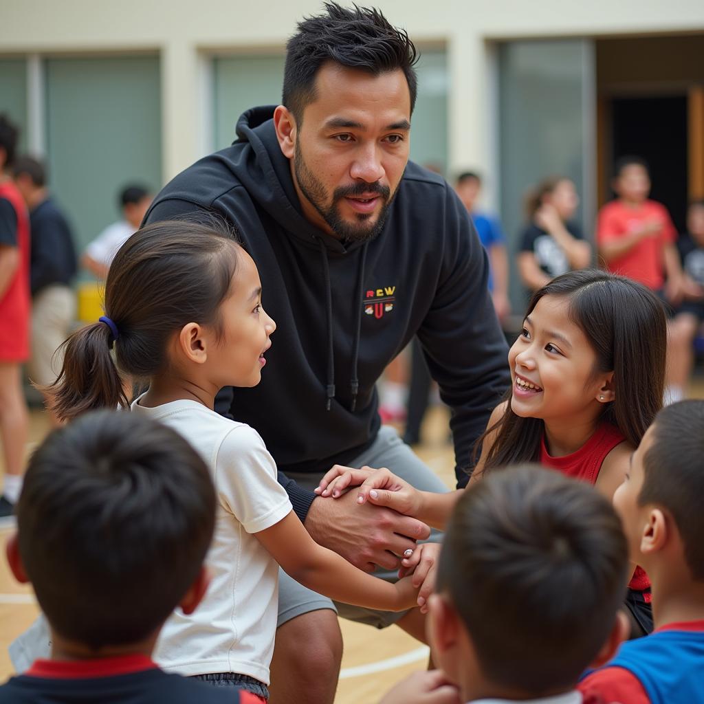 Vakeo Urbano coaching young athletes