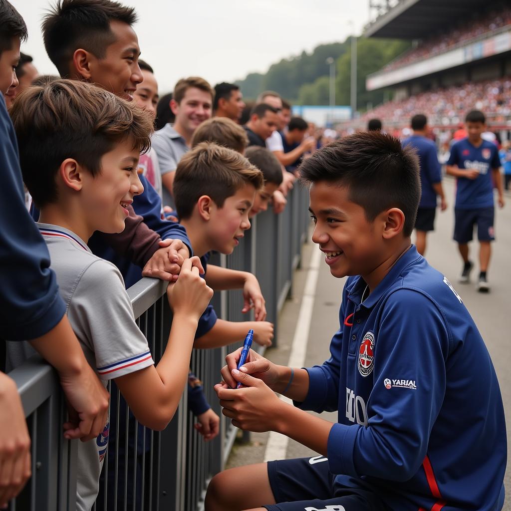 Yamal signing autographs for young fans