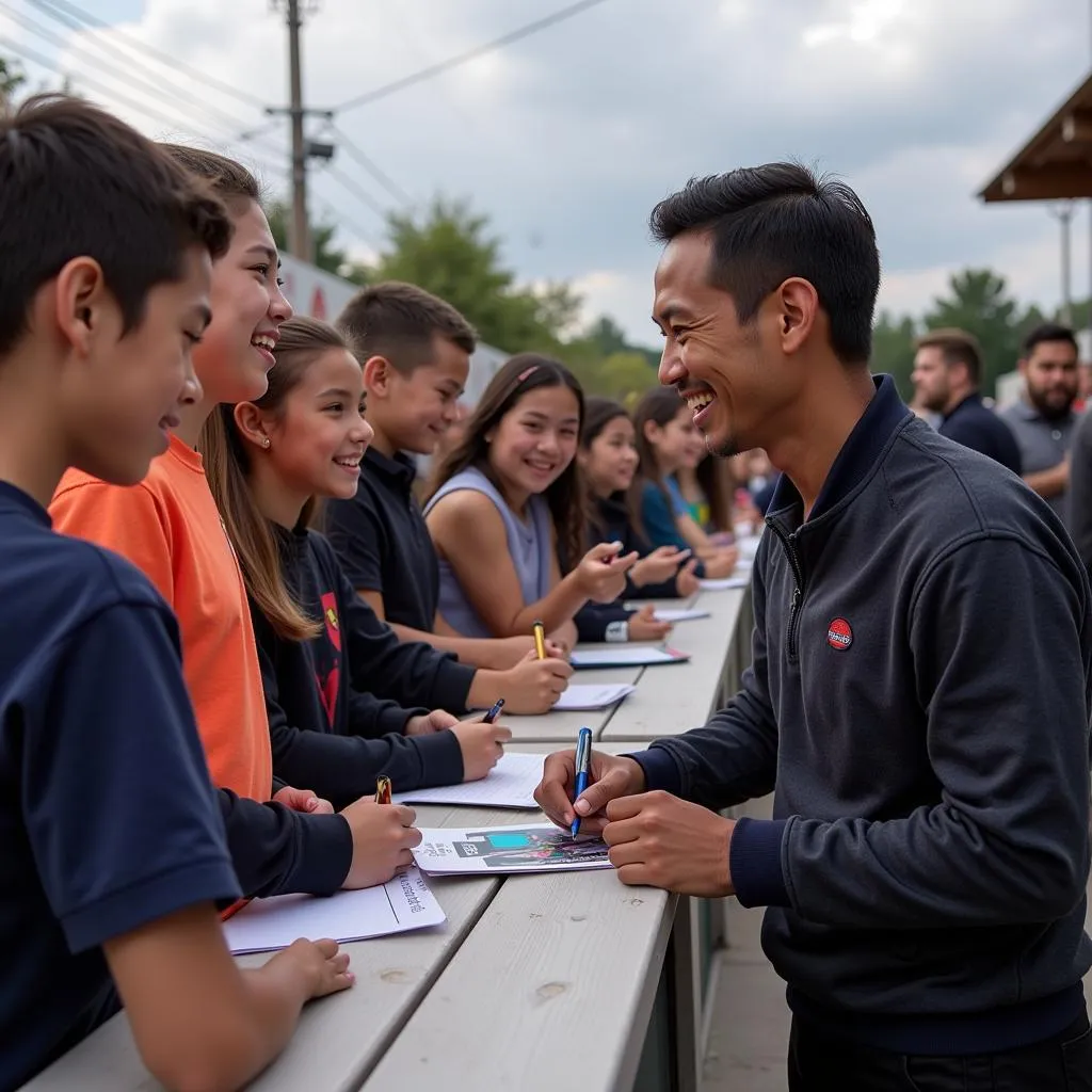 Yamal signing autographs for young fans