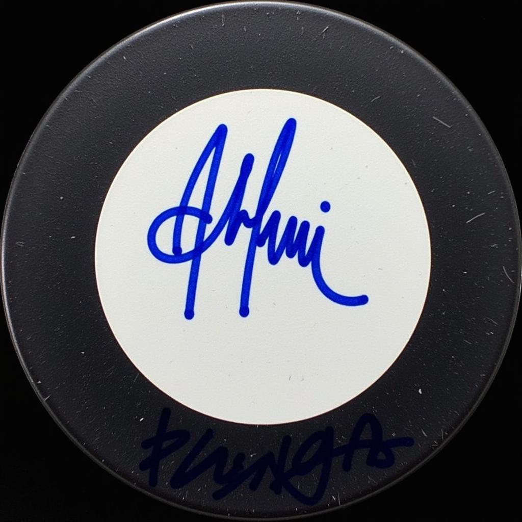 Close-up of an Artemi Panarin Signed Puck