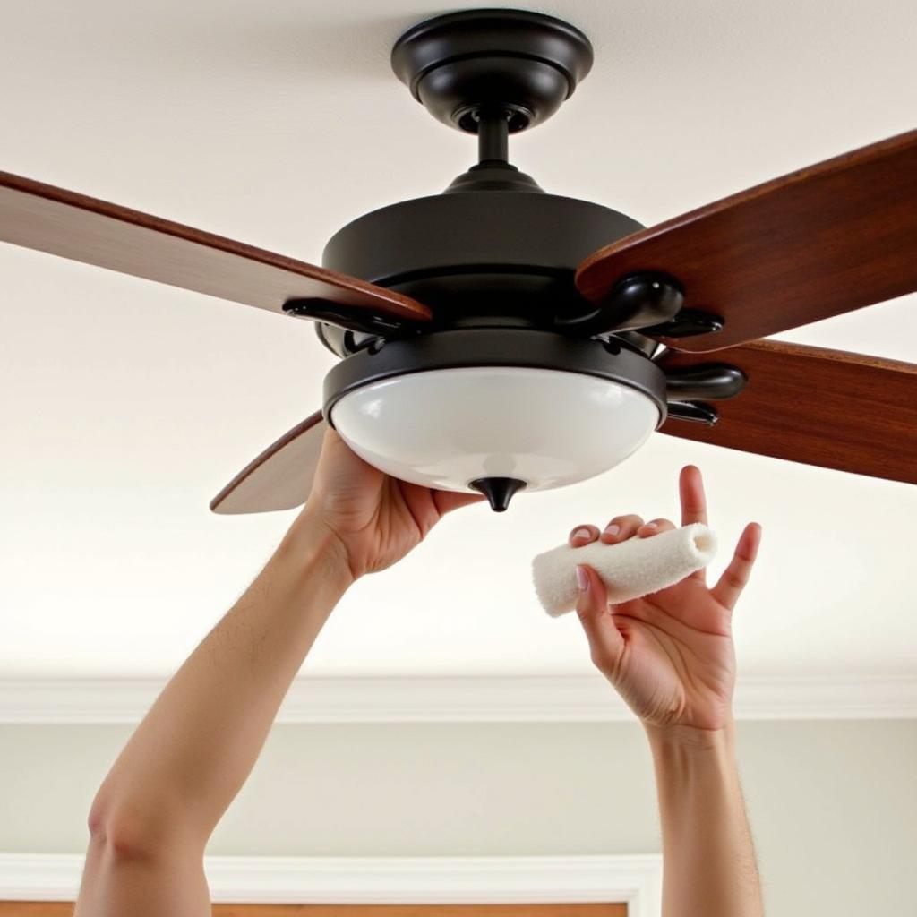 Cleaning mahogany ceiling fan blades with a soft cloth