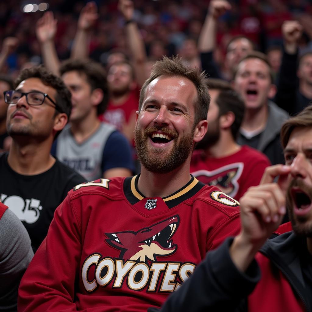 A fan proudly wearing an Arizona Coyotes jersey at a game, surrounded by other enthusiastic supporters.