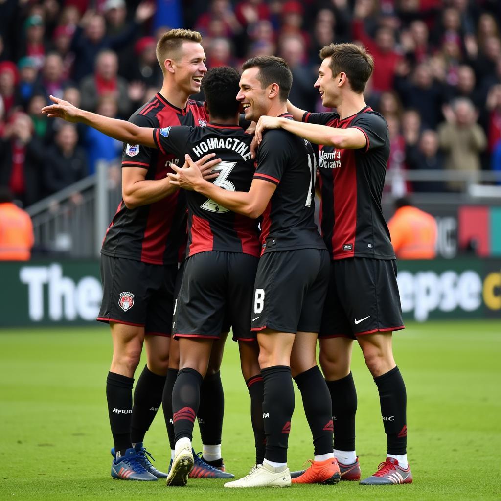 Josh Horne celebrating a goal with teammates