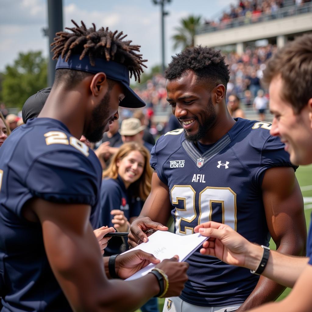 Kyren Williams interacting with fans while wearing his Notre Dame jersey.