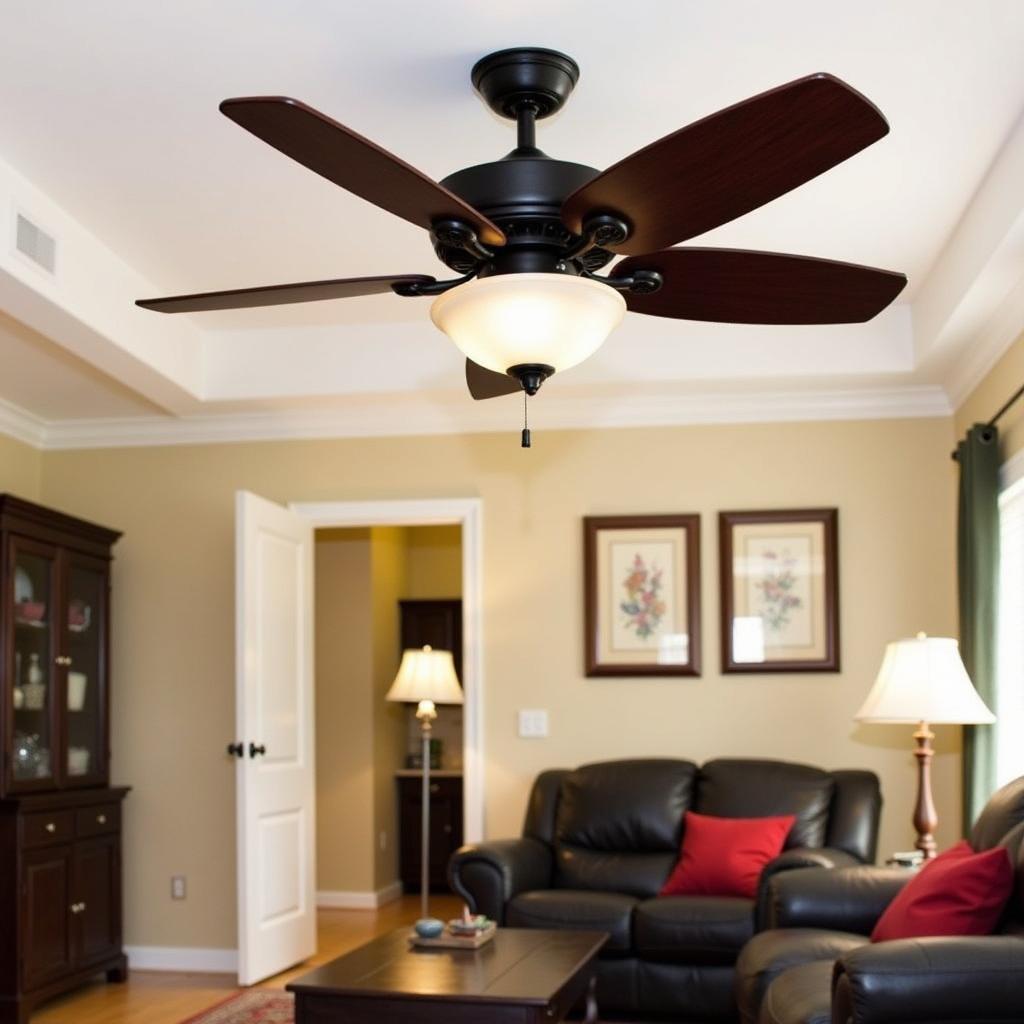 Mahogany ceiling fan in a traditional living room with dark wood furniture