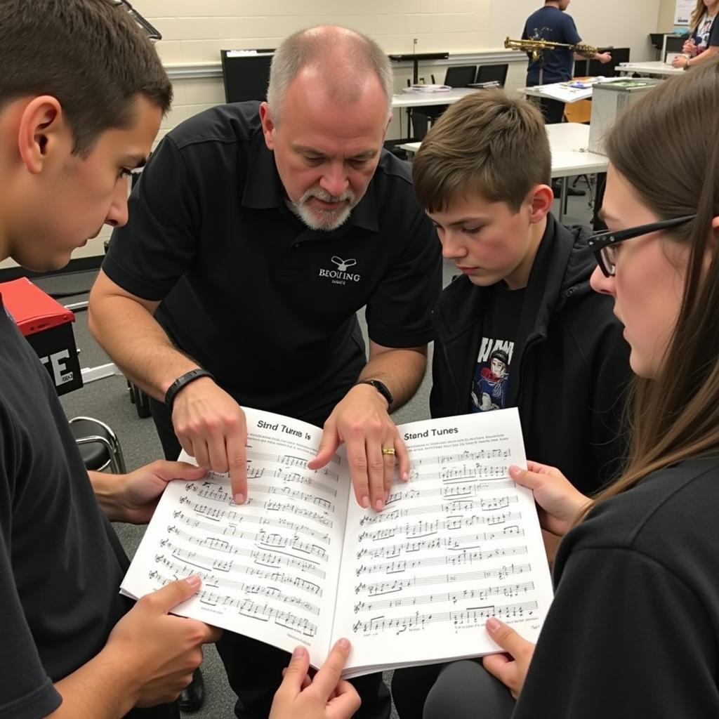 Marching band selecting stand tunes for a performance