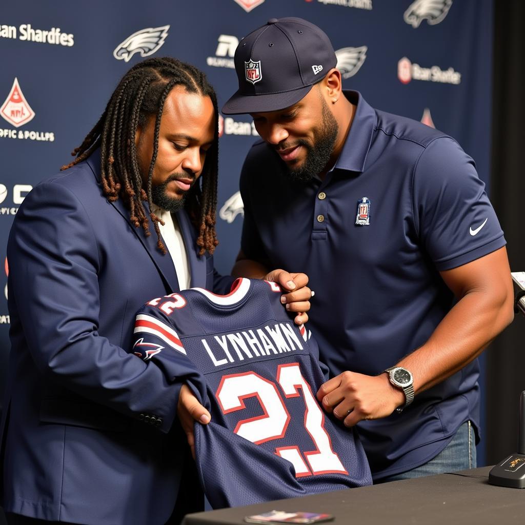 Marshawn Lynch signing a jersey at an autograph session.