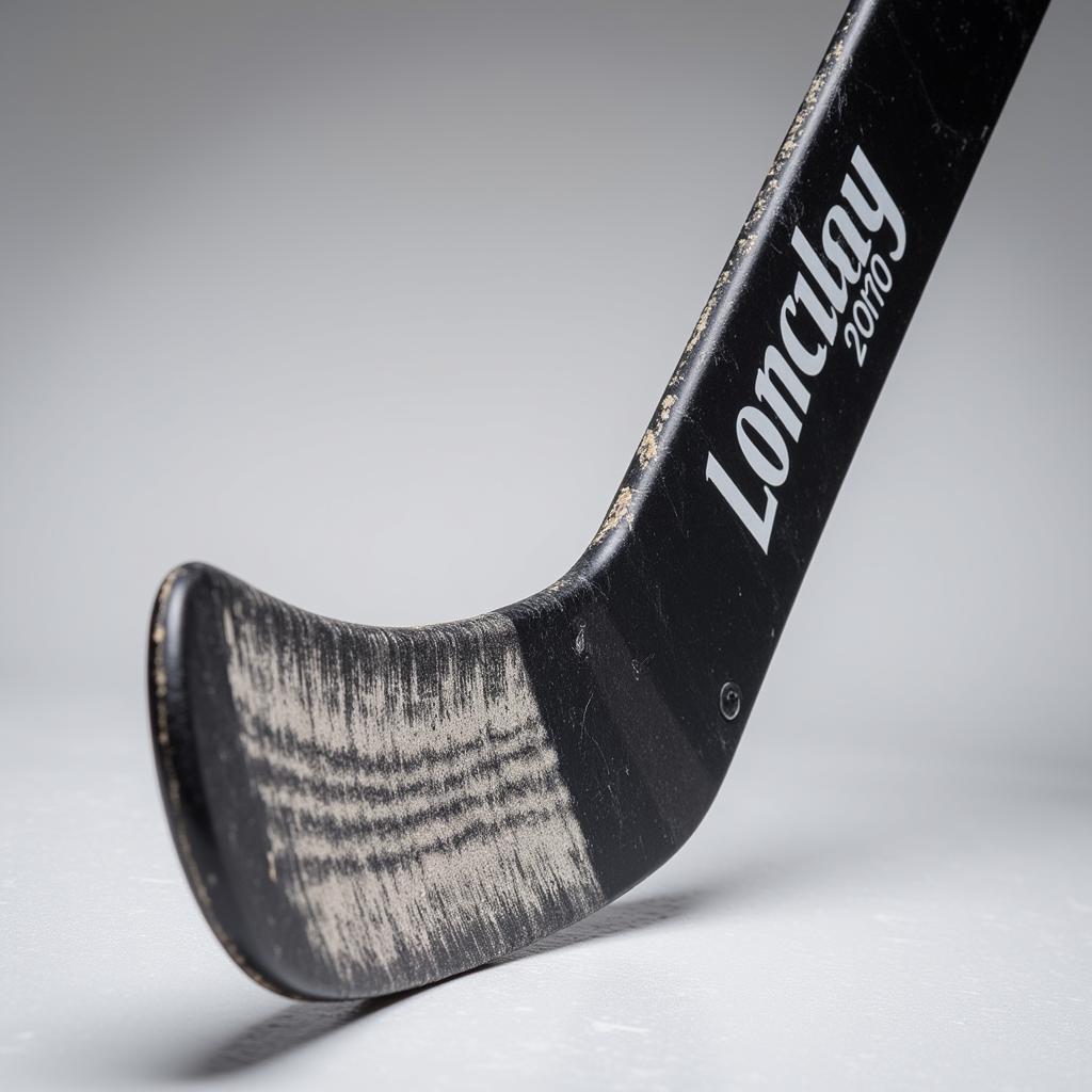 Close-up of William Nylander's hockey stick, showcasing the curve, grip, and branding.