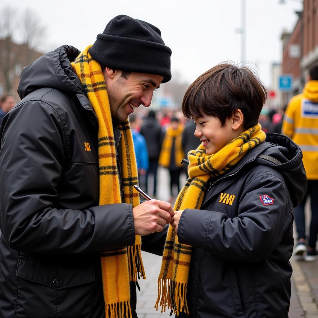 Yamal interacting with a fan and signing their plaid yellow scarf