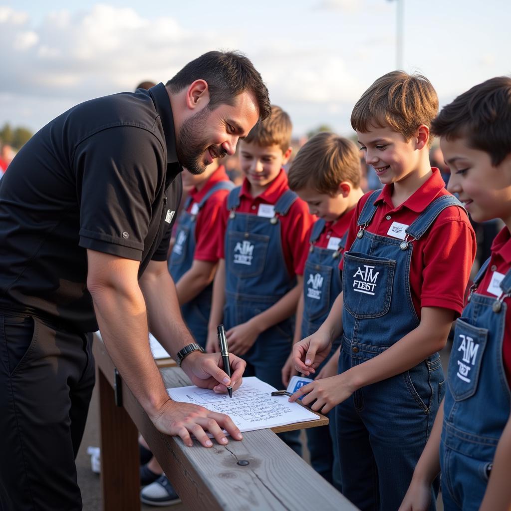 Yamal Signing Autographs for Fans in A&M Overalls