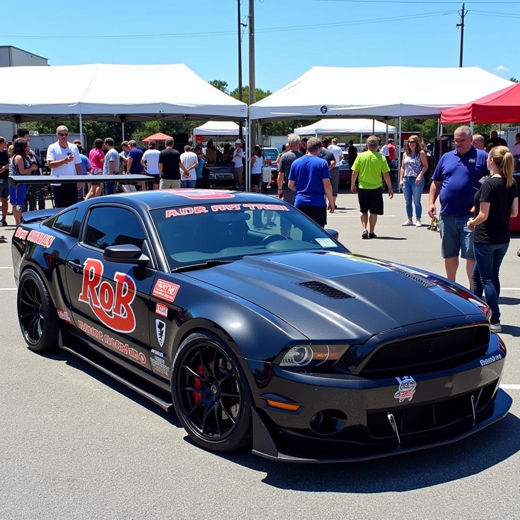 Car with Sponsor Decals at a Racing Event