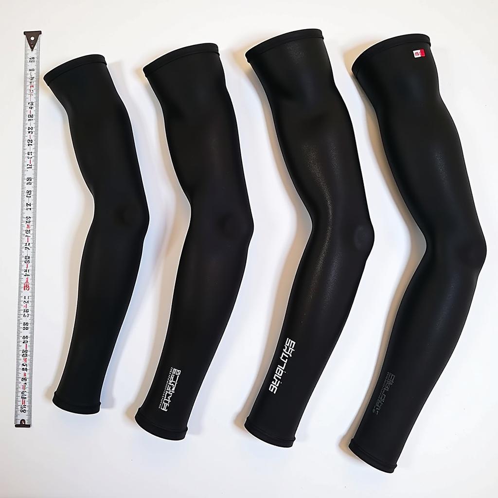 Various sizes of arm sleeves laid out for comparison