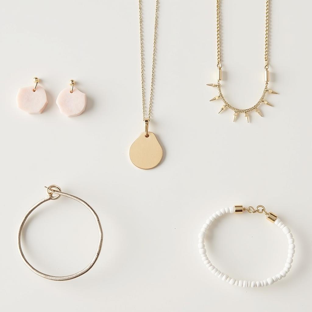 Minimalist EA Jewelry designs featuring clean lines and subtle details