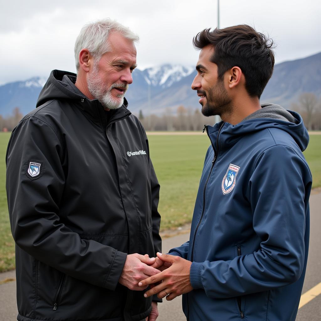 Fr. Ron Stone mentoring young Yamal, providing guidance and support.