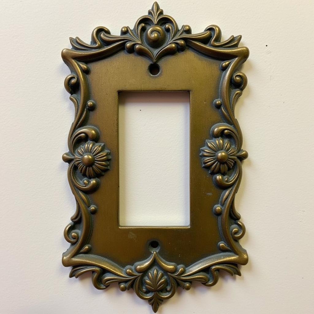 Ornate Victorian Antique Light Switch Cover in Brass