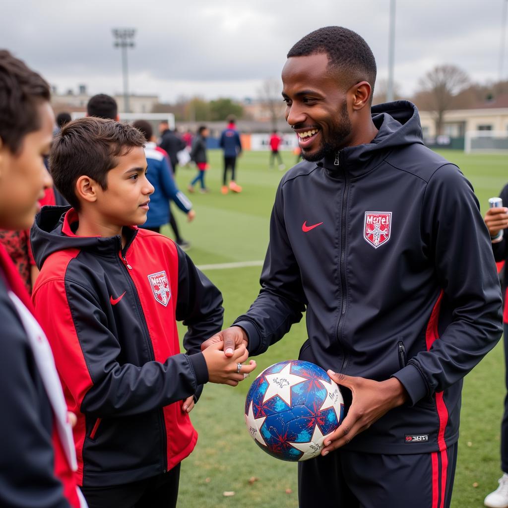 Yamal interacting with young fans, inspiring the next generation.