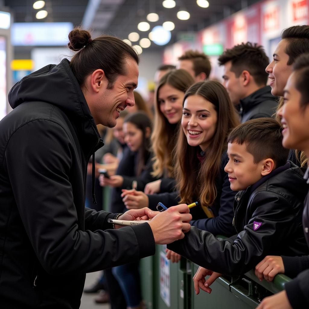 Yamal interacting with fans after a match