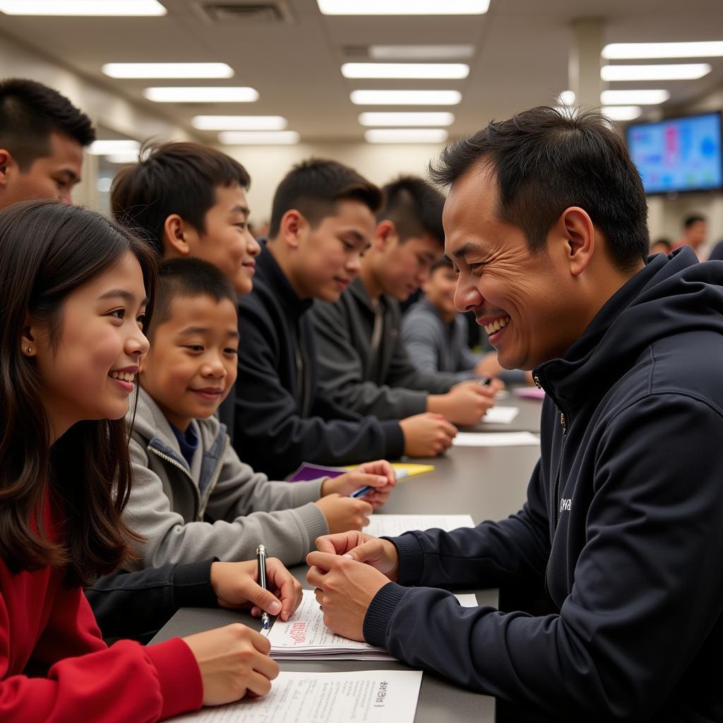 Yamal interacts with young fans, signing autographs and sharing a moment of connection.