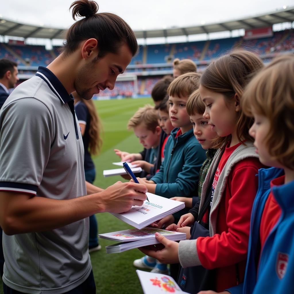 Yamal signing autographs for fans