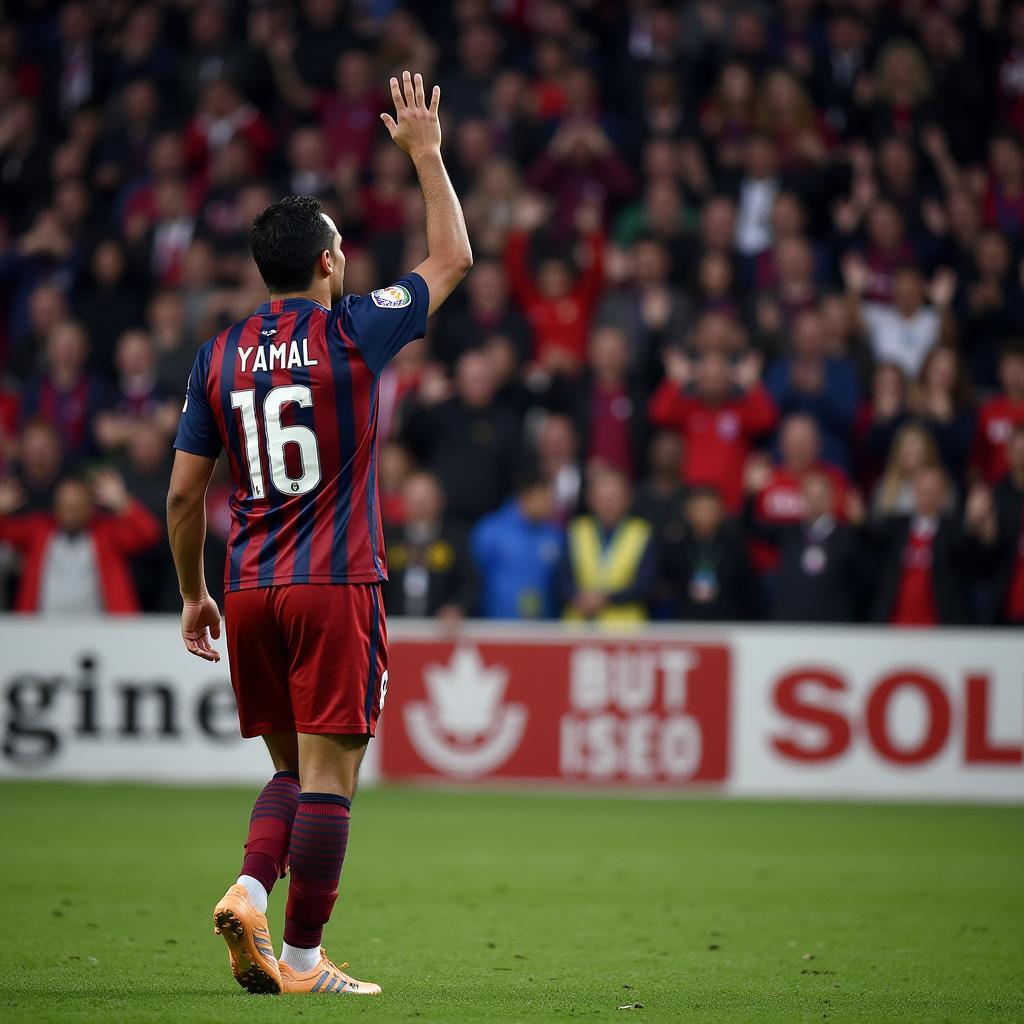 Lamine Yamal acknowledging the crowd after a positive play during the Strasbourg match.