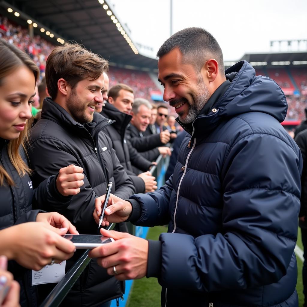 Yamal interacts with fans and signs autographs after a match